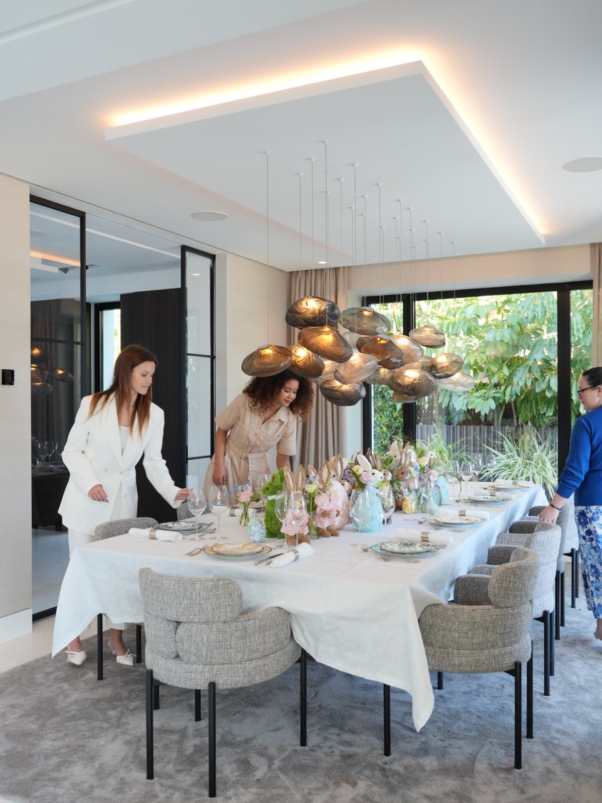 A beautifully set Easter lunch table in a modern Marbella villa